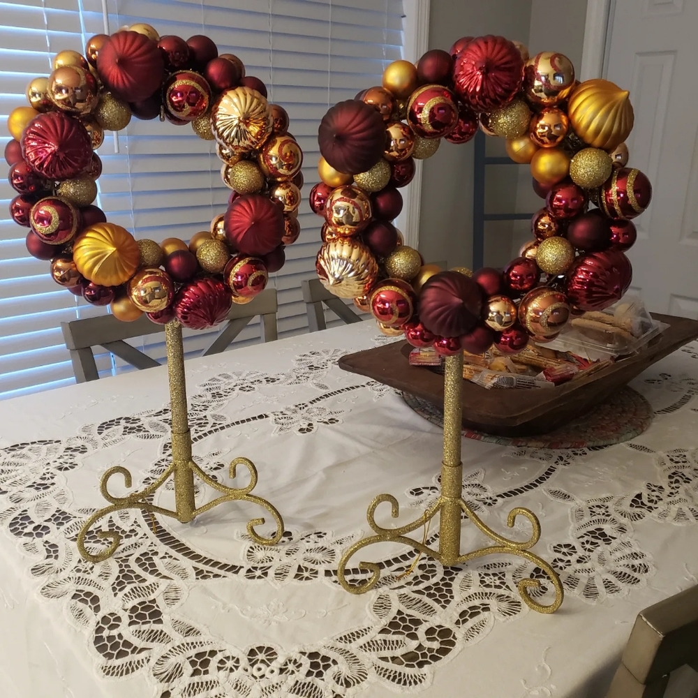 Two Shatterproof Ornament Wreaths with Gold Stands by David Shindler